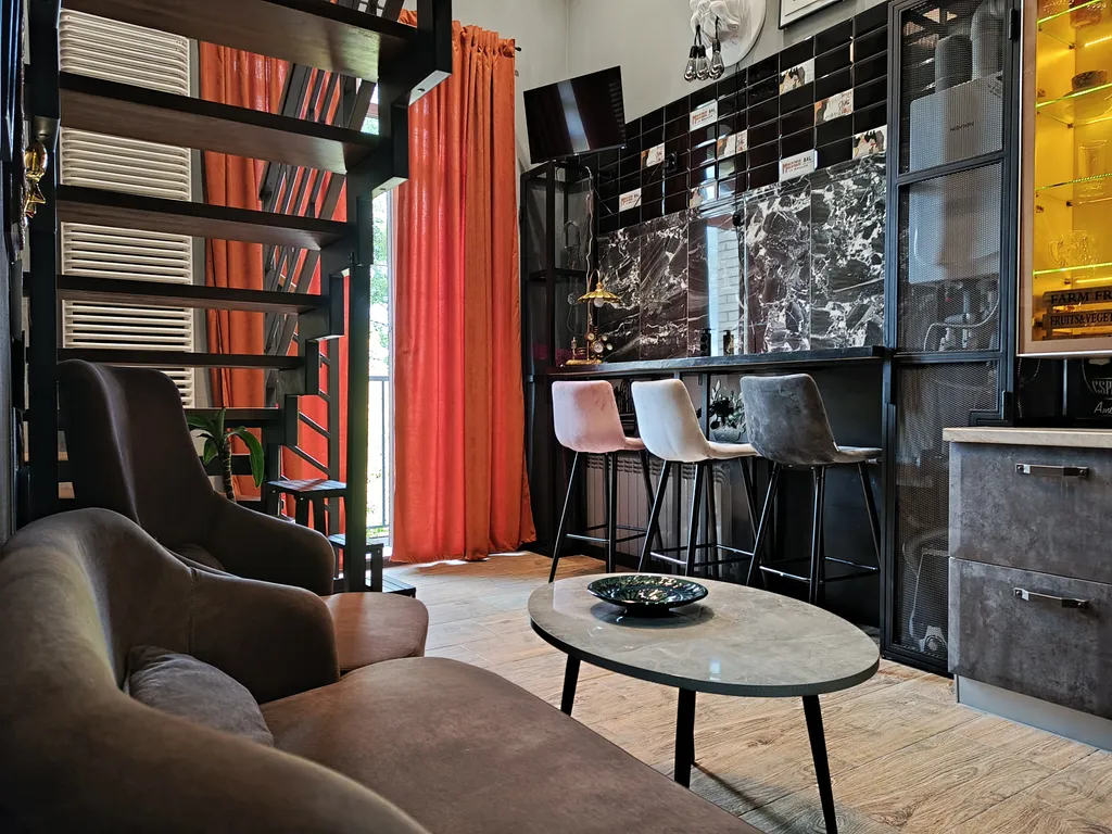 Атмосферная двухуровневая квартира с видом на Петропавловский парк