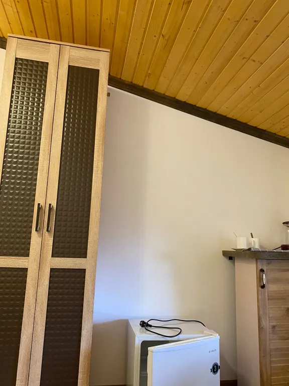 Номер отельного типа с видом на Домбай и лес