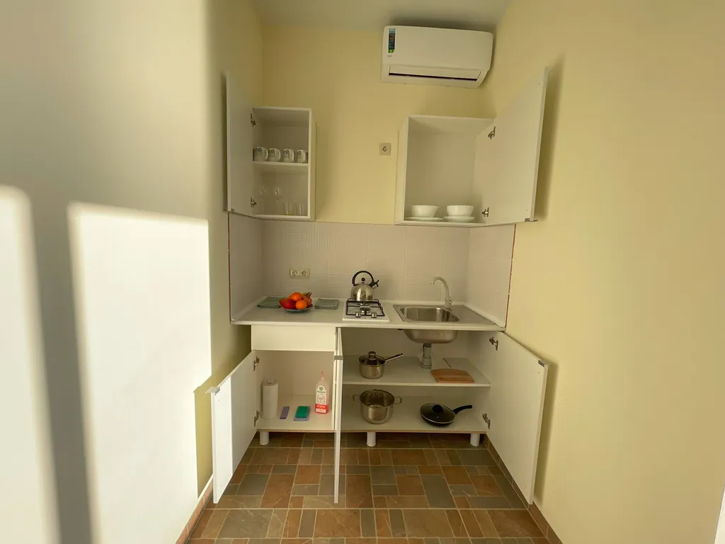 Коттедж Сдвоенные апартаменты с просторной солнечной террасой — Нижнее Учдере