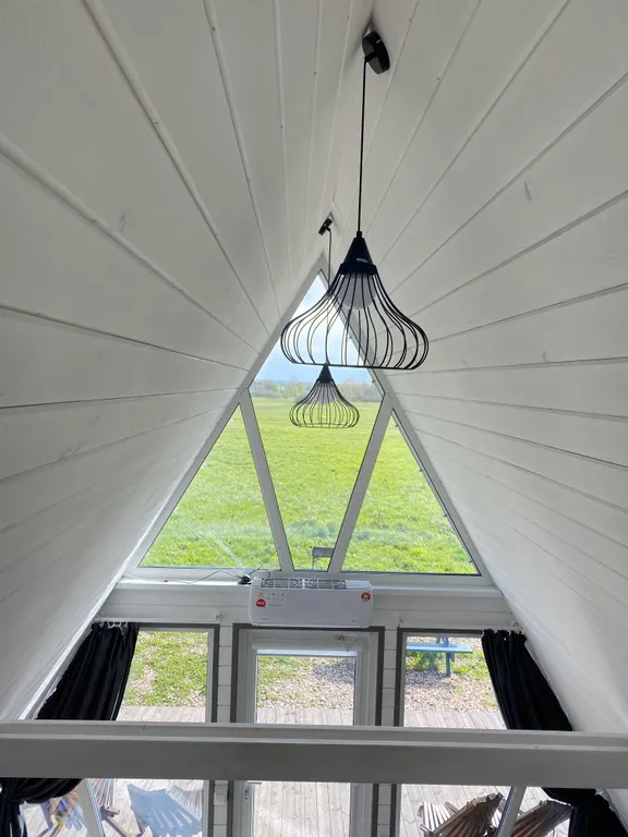 Треугольный дом