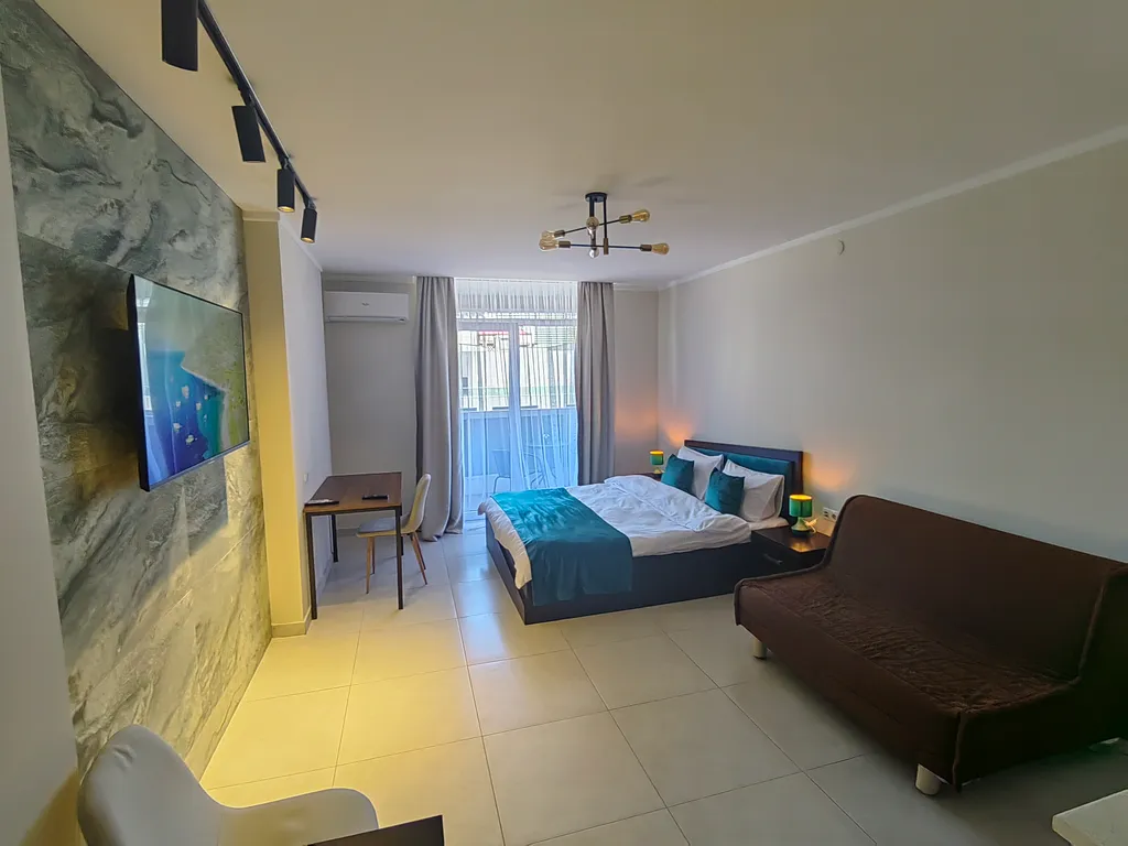 Квартира Квартира Большая студия с балконом и видом на море. 425 — Батуми