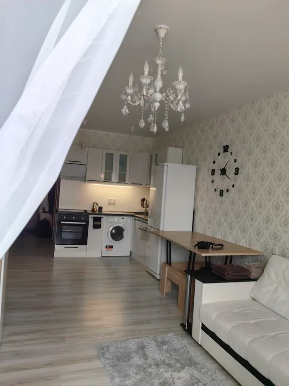 Уютная студия с видом на город