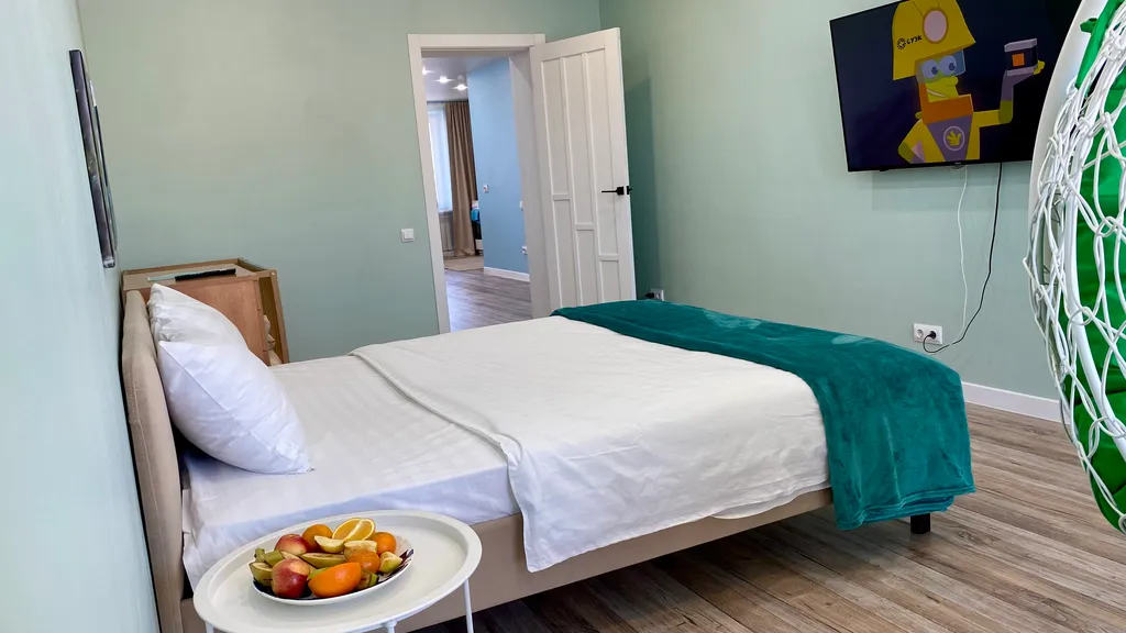 Ваш оазис спокойствия с видом на реку и горы в центре городской жизни