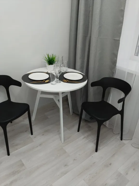 Квартира с видом на ели