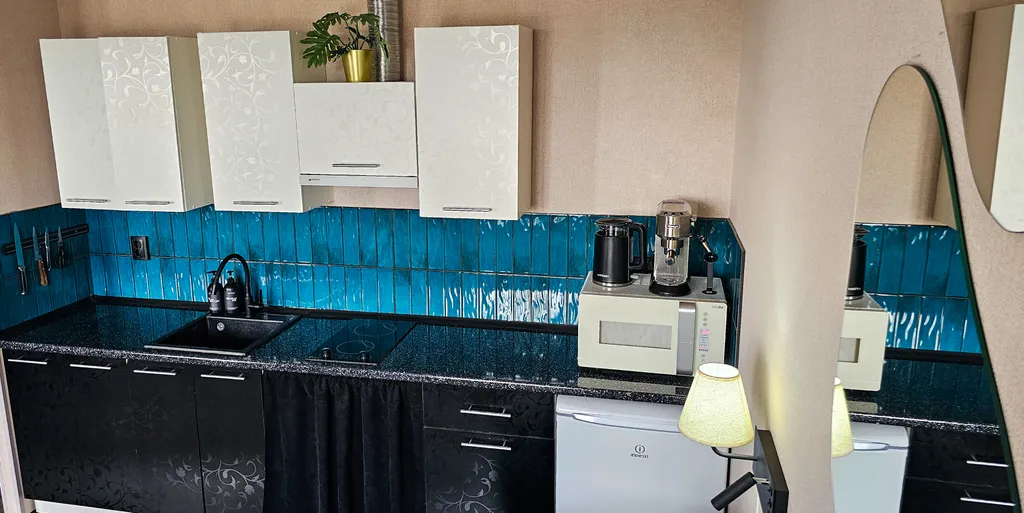 Большая студия с панорамным балконом, видом на реку