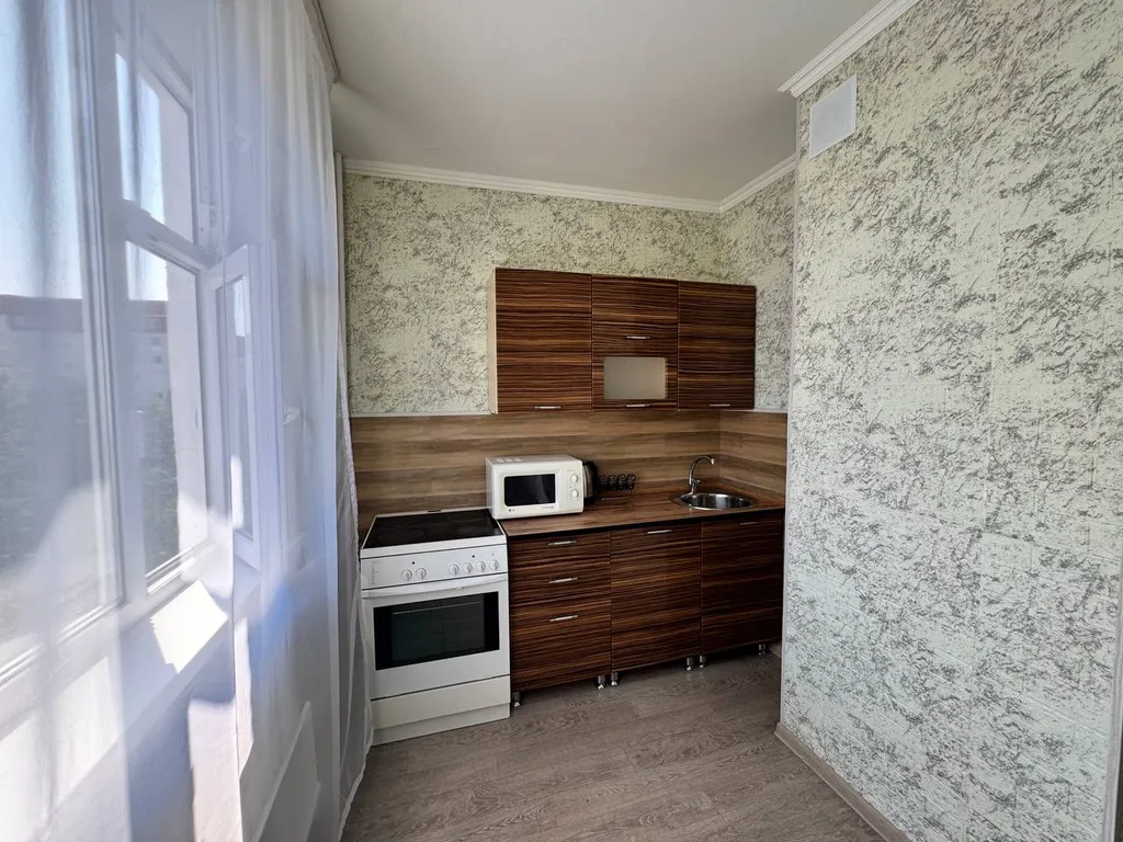 Апартаменты с балконом и рабочим местом в центре. Бесконтактный заезд