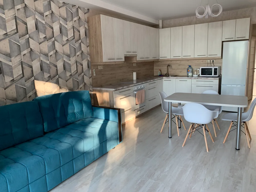 Новые апартаменты c террасой и видом на город и море