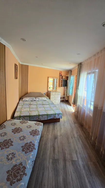 Этаж коттеджа в зелёном саду