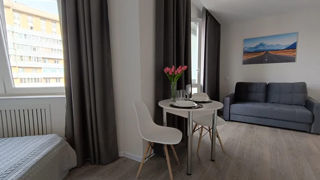 Новая уютная студия на 13 этаже в самом сердце города