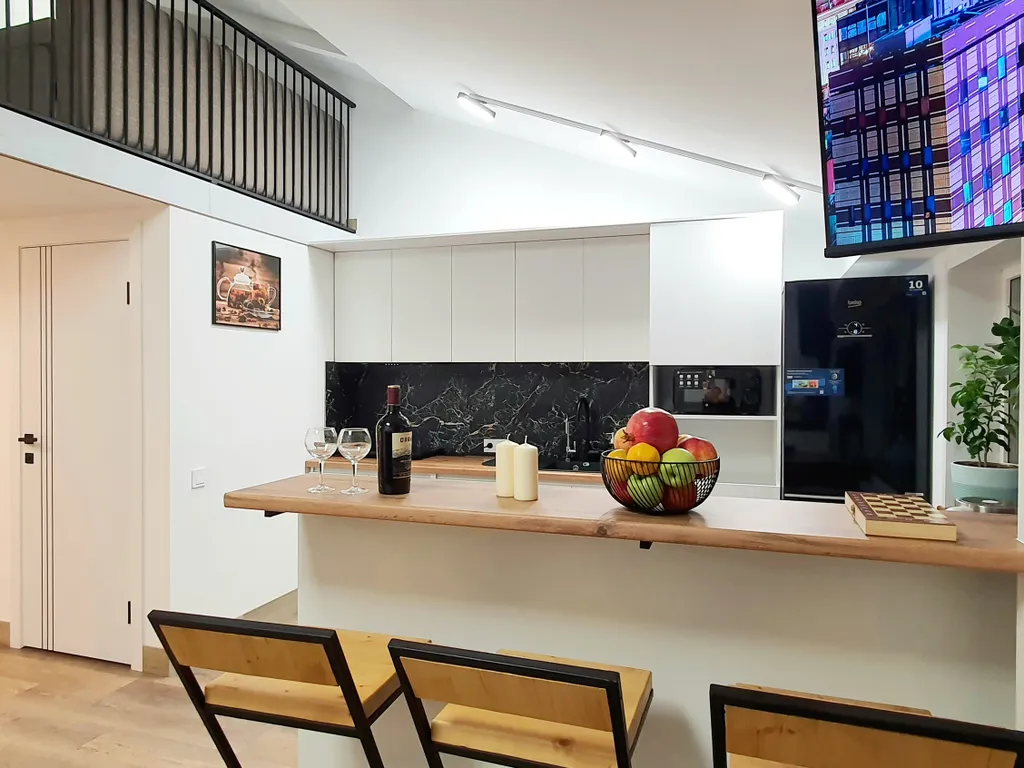 Комфортный двухуровневый апартамент в элитном комплексе