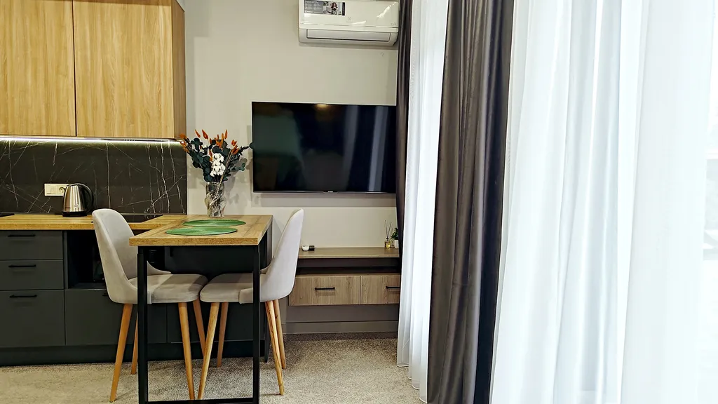 Студия с персональным выходом к шезлонгам - и вы любуетесь горами