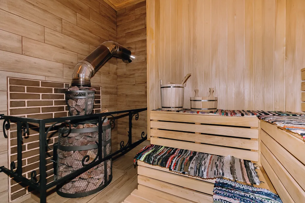 Коттедж двухэтажный с сауной, бассейном, детской площадкой