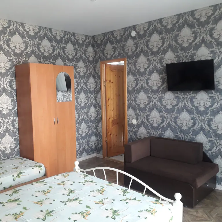 Уютные номера с видом на горы и в сад