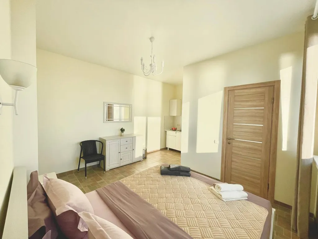 Коттедж Сдвоенные апартаменты с просторной солнечной террасой — Нижнее Учдере