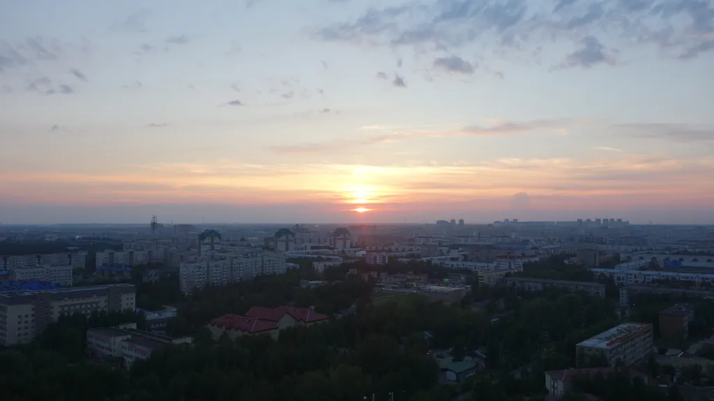 Красивый панорамный вид на закат с 23 этажа