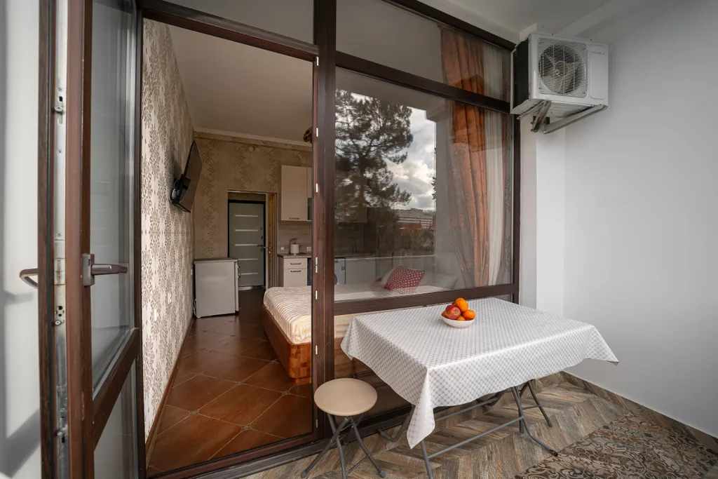 Очень теплый апартамент с открытым балконом, кухней, парковкой