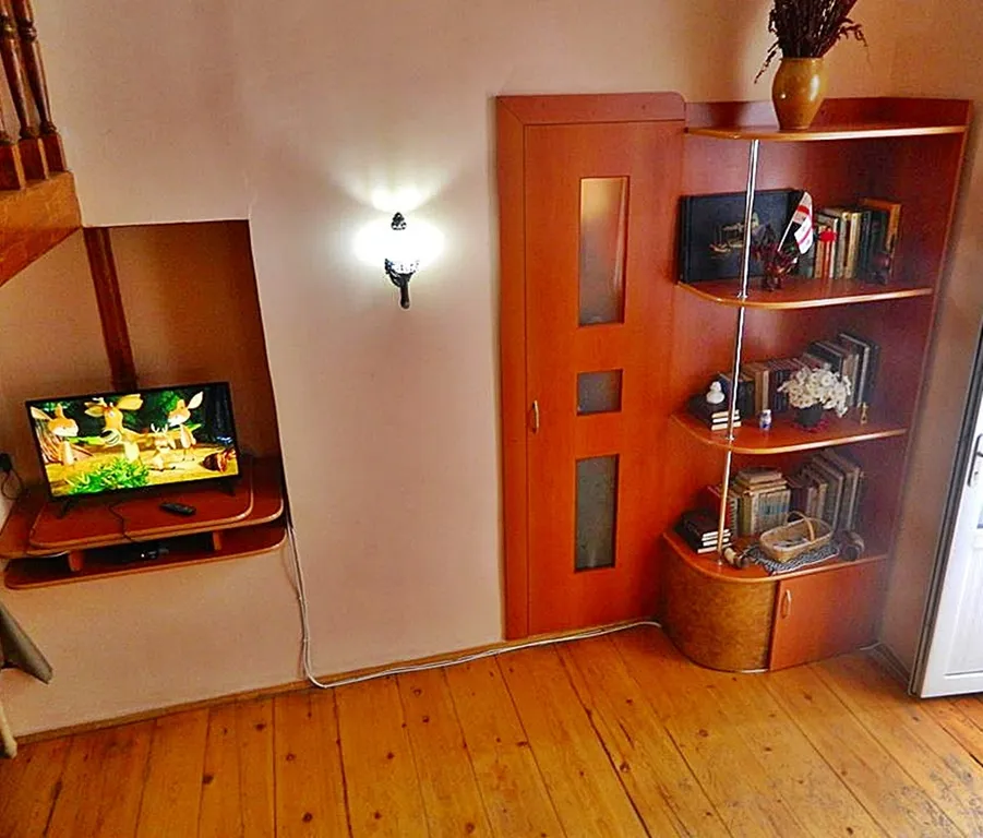 Двухуровневый апартамент с балконом в старом городе