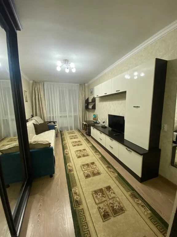 Светлая комната в гостевой квартире