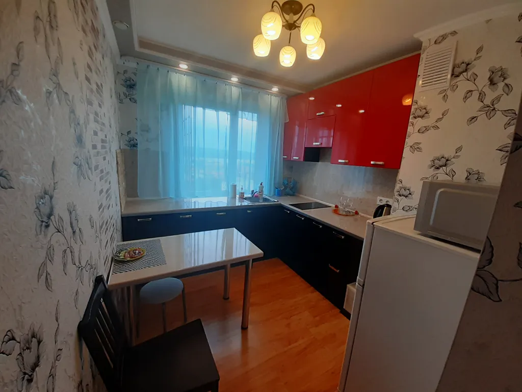 Квартира с балконом и видом на город