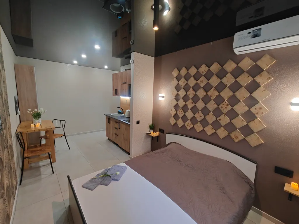 Квартира Уютная студия напротив университета и парка в центре Нефтяников — Омск