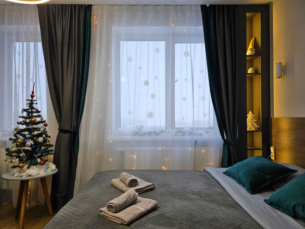 Уютная дизайнерская квартира с прекрасным видом из окна