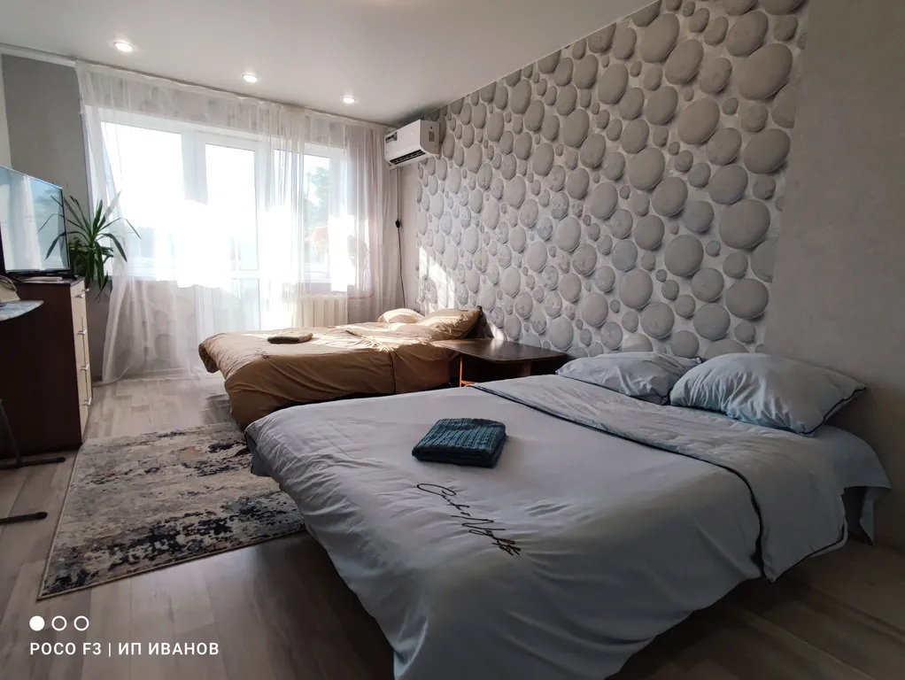 Двухкомнатные апартаменты с балконом в центре