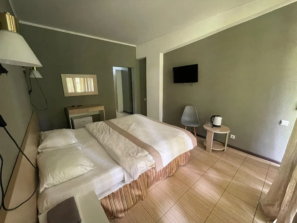 Квартира Квартира Уютный номер на 1 этаже с видом на парк с балконом. — Гагра