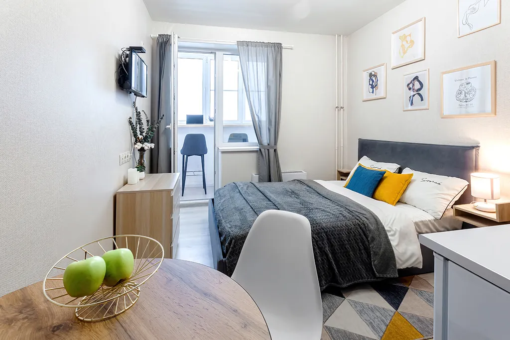 Стильная студия с видом на город в 20 минутах до центра