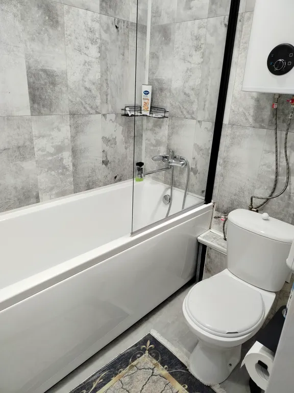 Уютная квартира в новом доме в 10 минутах от центра города