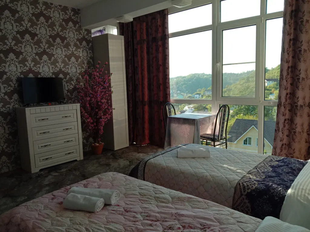 Этаж с видом на море, лес и горы