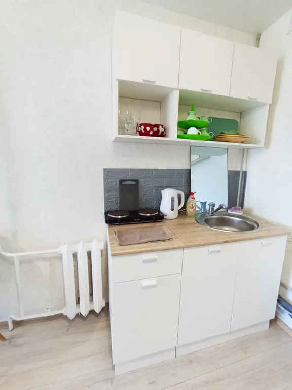 Комната-студия в общежитии в центре города.