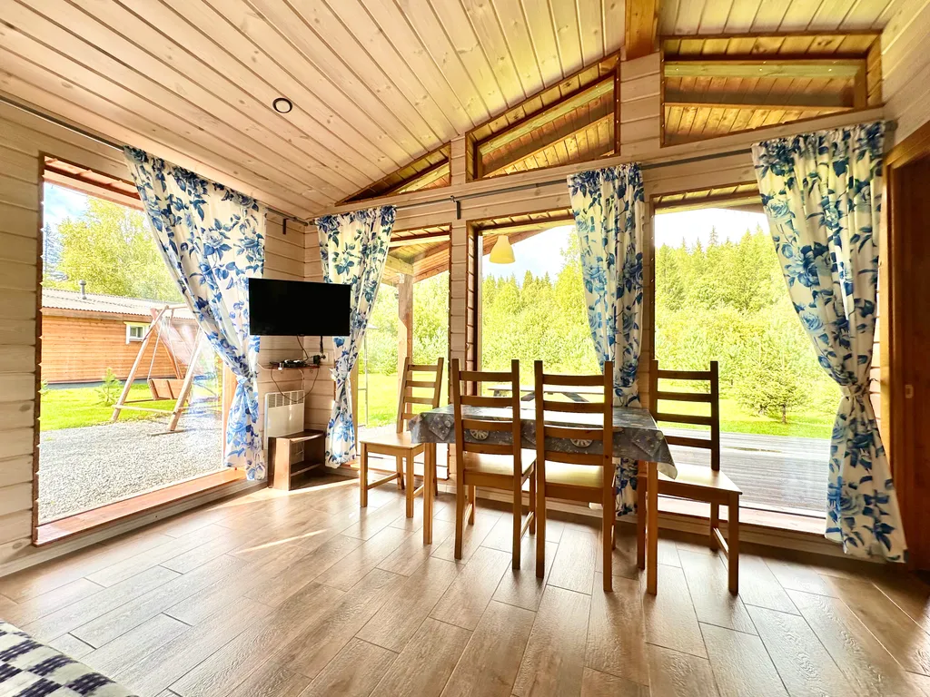 Коттедж с сауной и панорамным остеклением