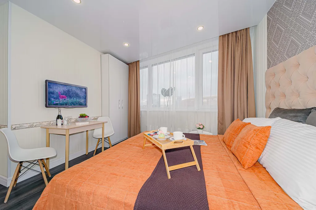 Удобная локация в самом центре с панорамой на город и арену