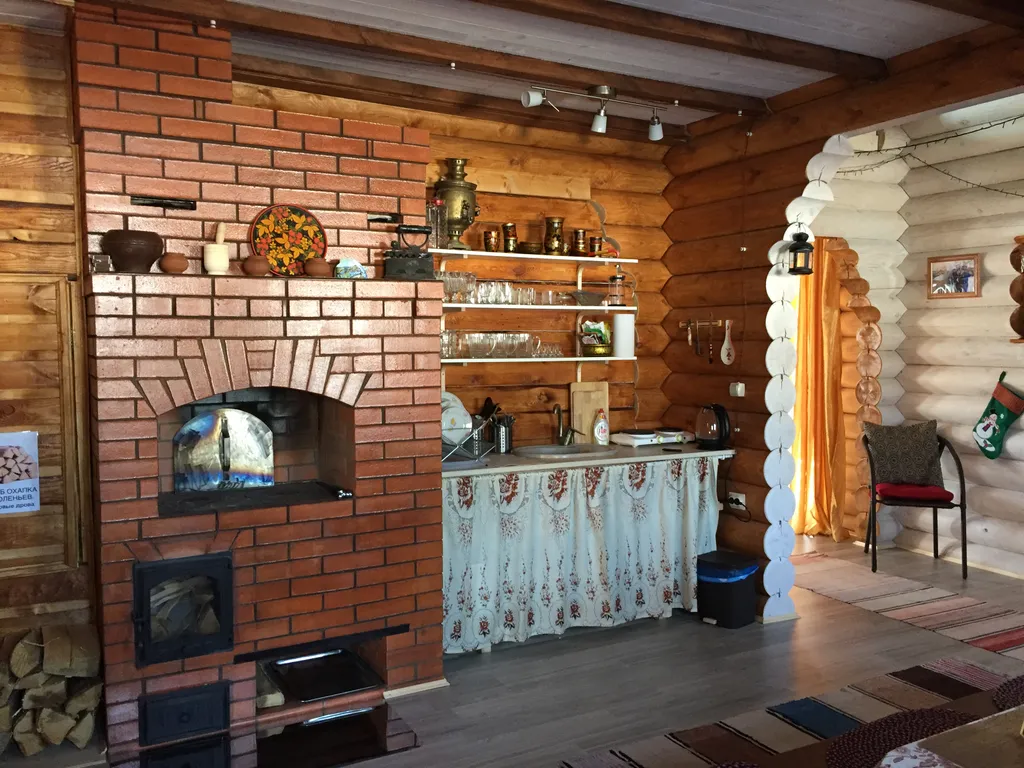 Дом из бревна Терем с сауной в черте города