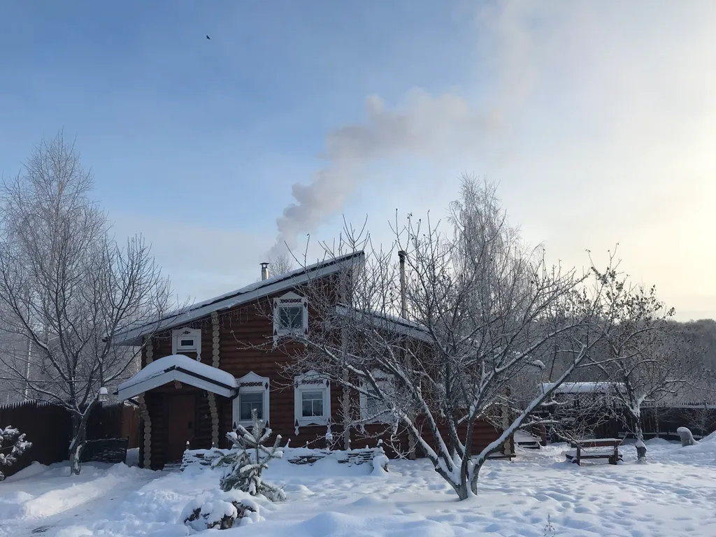 Дом из бревна Терем с сауной в черте города