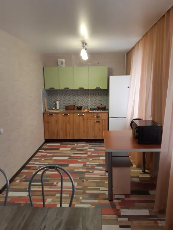 Просторная с большой кухней-гостиной