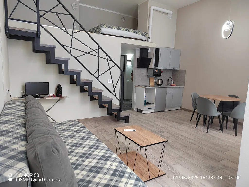 Шикарная двухуровневая студия в центре