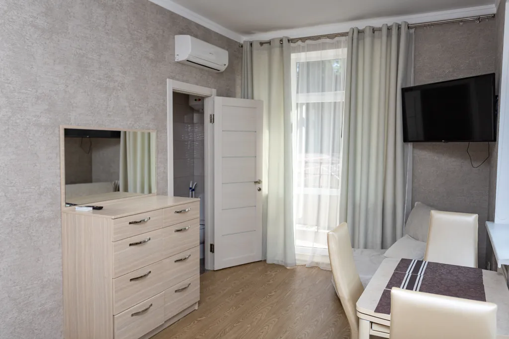 Светлая 1-комнатная квартира с панорамным балконом