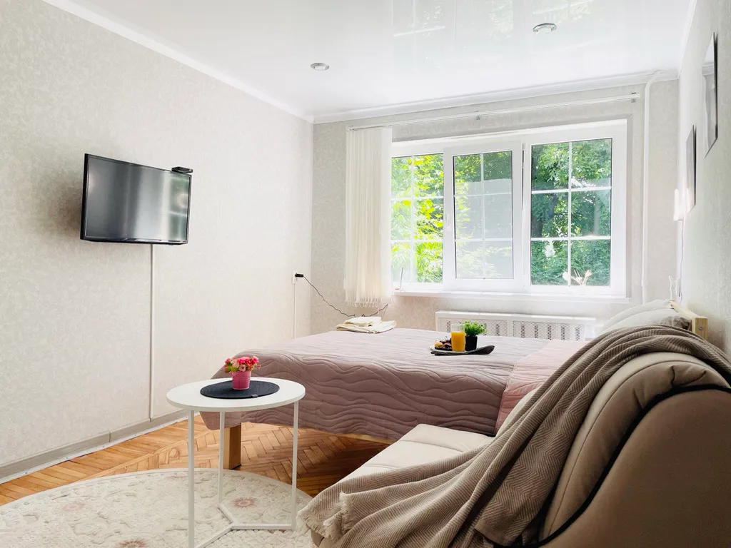 Апартамент Svetlo Teplo c окнами в сад