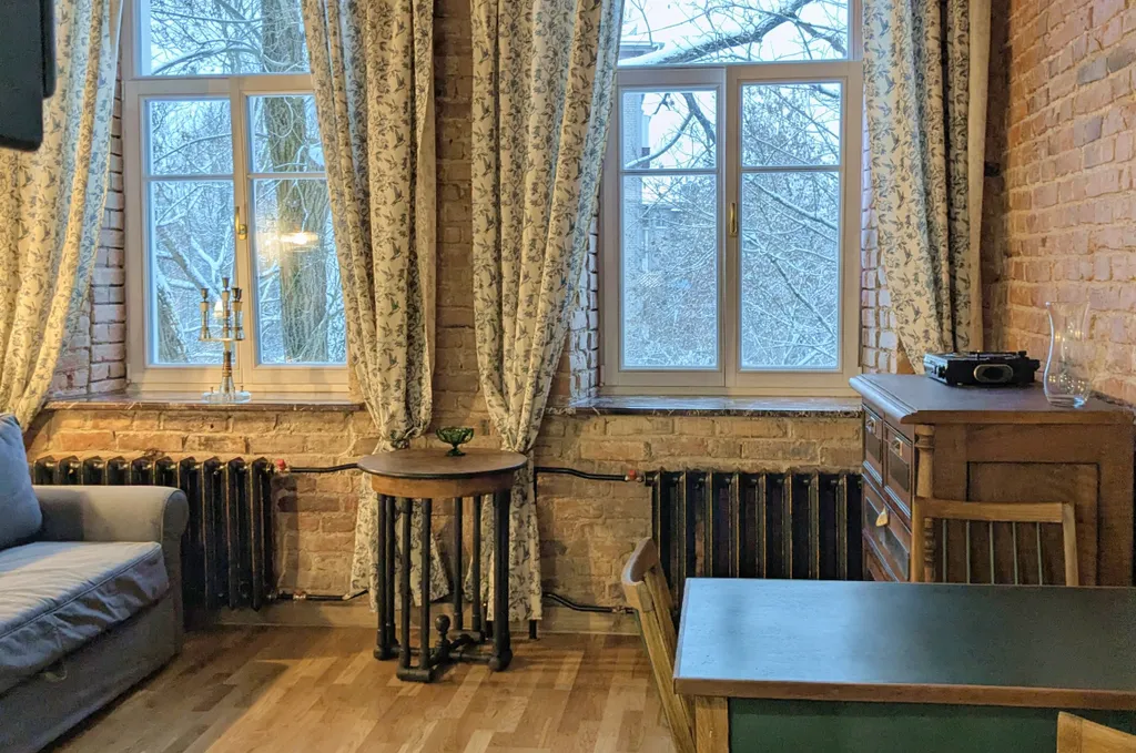 Уютная двухуровневая квартира-студия в доме XIX века