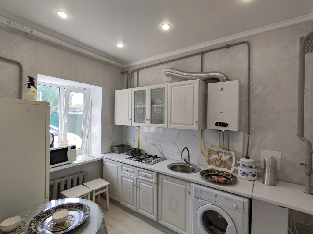 Уютная двухкомнатная квартира с отдельным входом в центре района