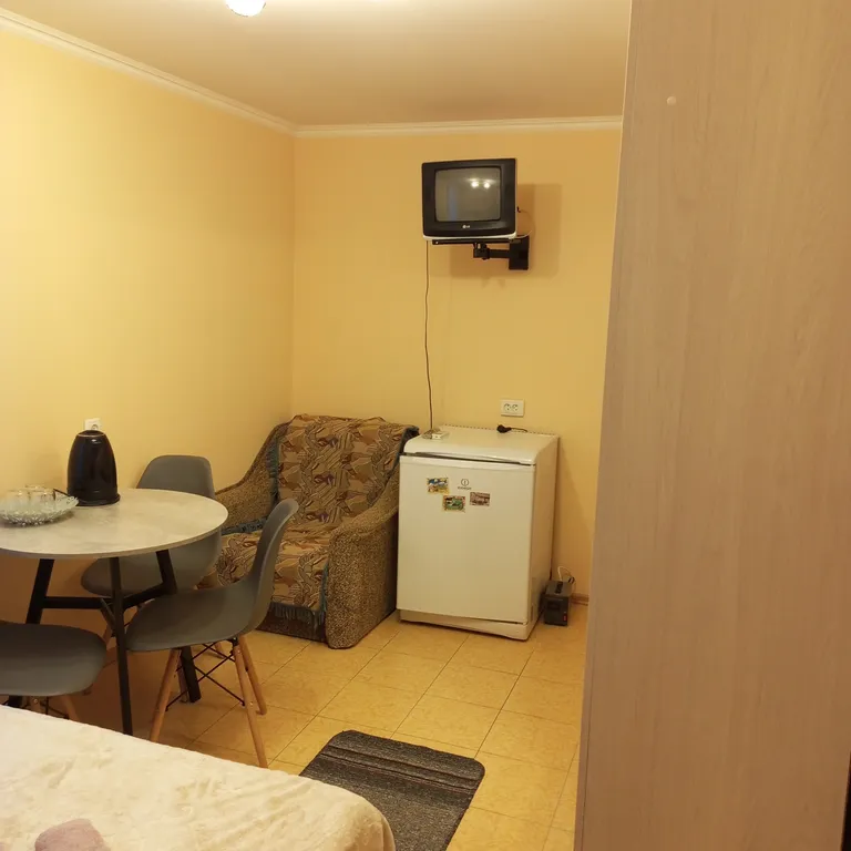 Уютный номер в коттедже в самом центре города.