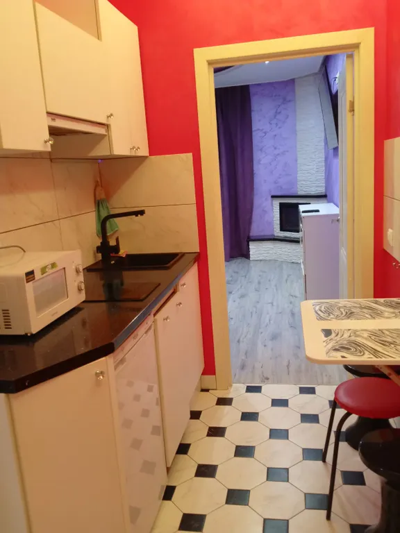 Уютная стильная студия с дизайнерским ремонтом