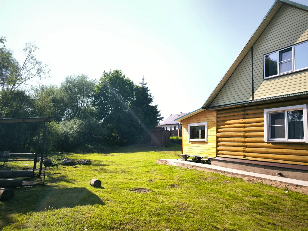 Новый бревенчатый дом в центре