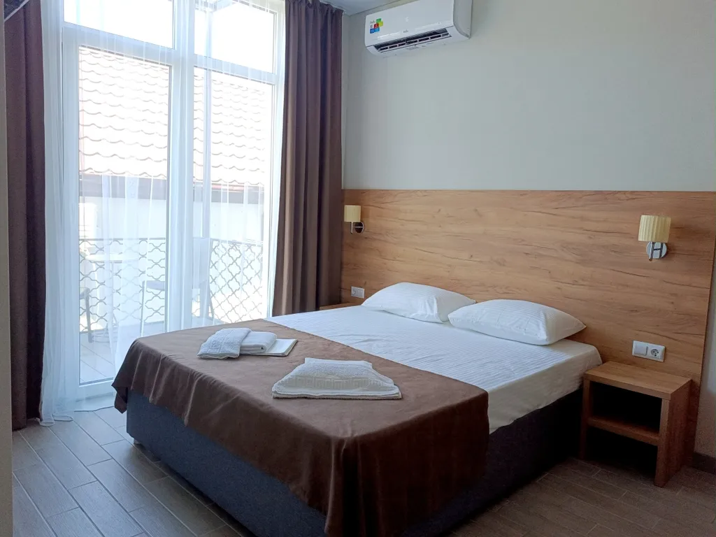 Двухместный номер с балконом с видом на фасад