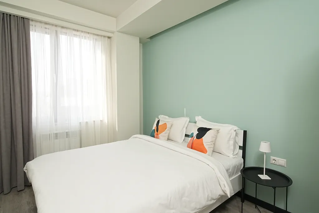 Улучшенные апартаменты с балконом в центре города