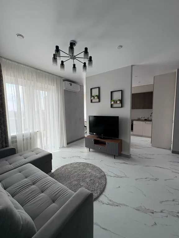 Уютная, новая квартира в центре города