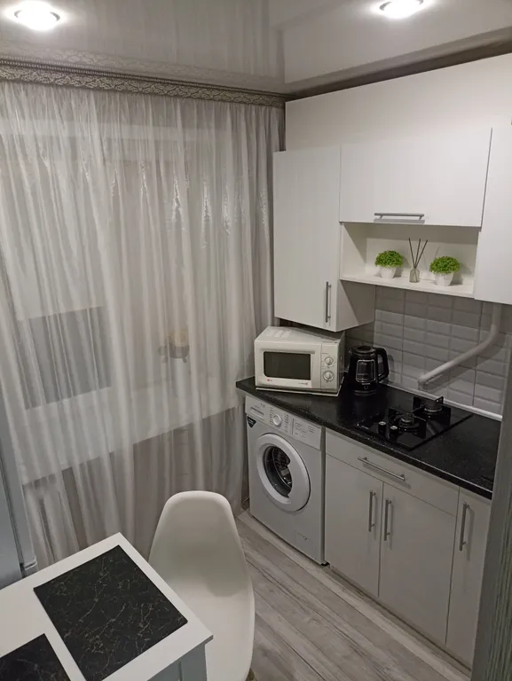 Квартира в центре на первом этаже с асфальтированной парковкой