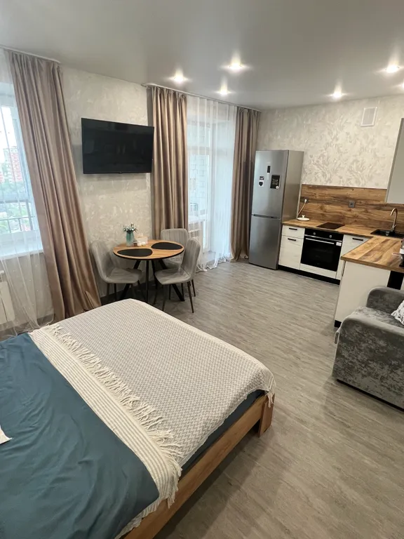 Уютная студия с кофемашиной в центре