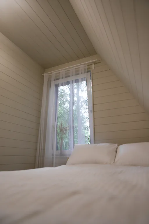 Нескучный треугольный дом Mökki с купелью